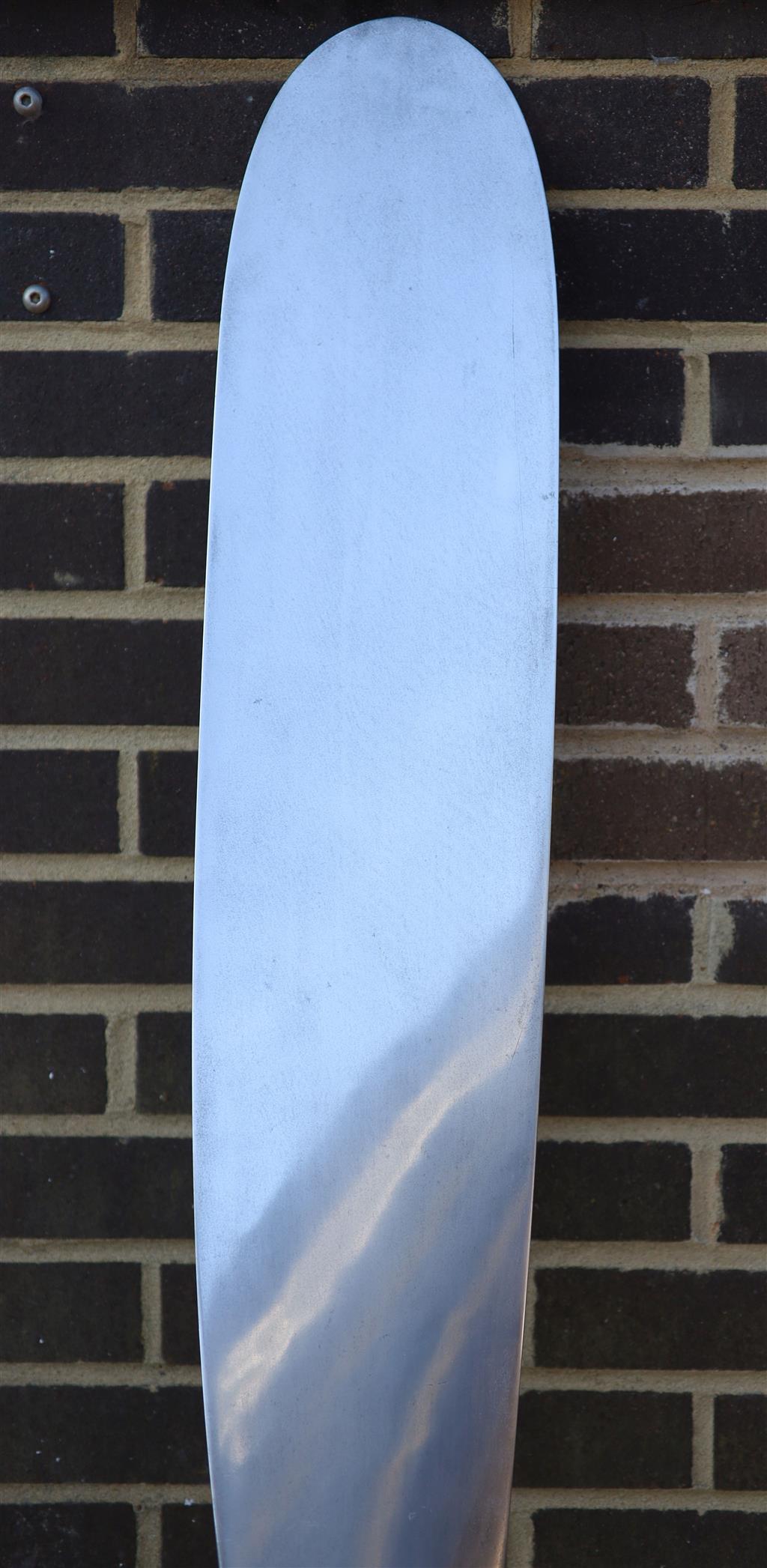 A Hartzell aluminium propeller blade ornament, length 228cm